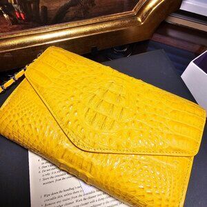 Crocodile skin River Clutch bag